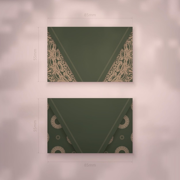 Business card template in green color with vintage brown ornament for your contacts.