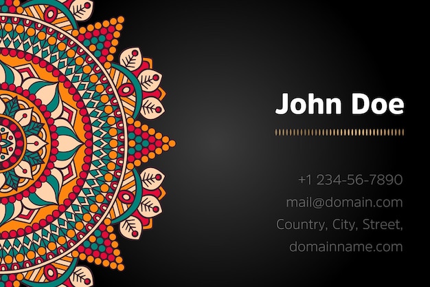 Business card with gold mandala design