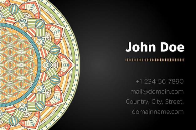 Business card with gold mandala design