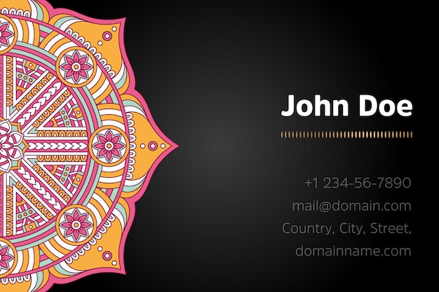 Business card with gold mandala design