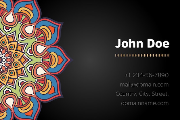 Business card with gold mandala design