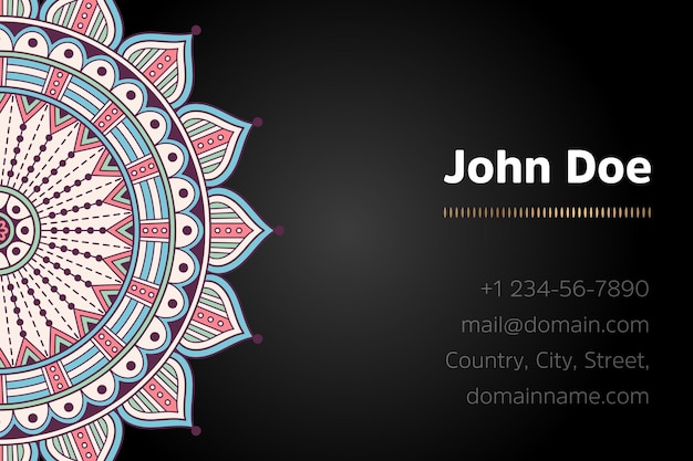 Business card with gold mandala design