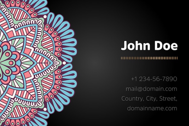 Business card with gold mandala design