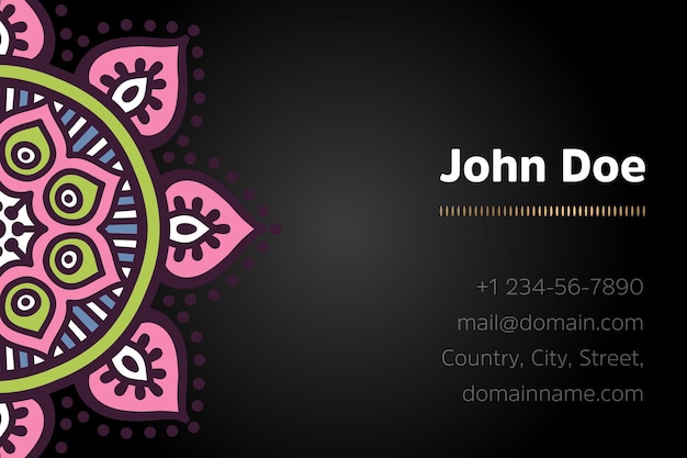 Business card with gold mandala design