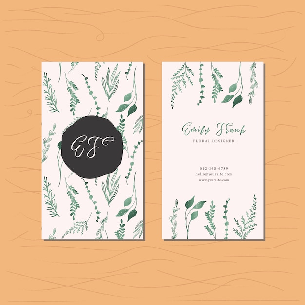 Business card with green metallic leaves pattern