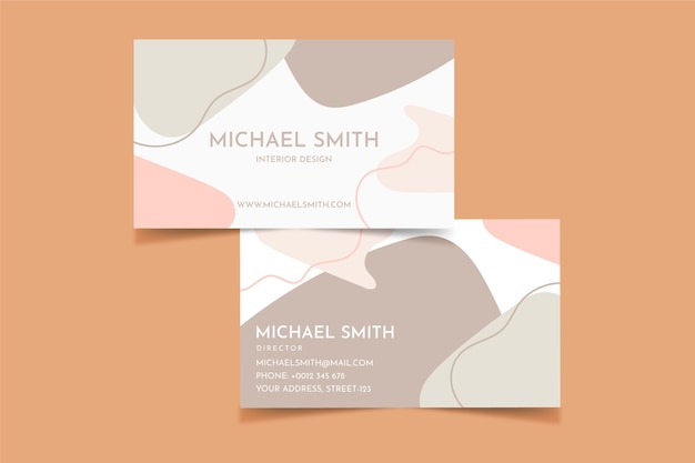 business card with pastel-colored stains