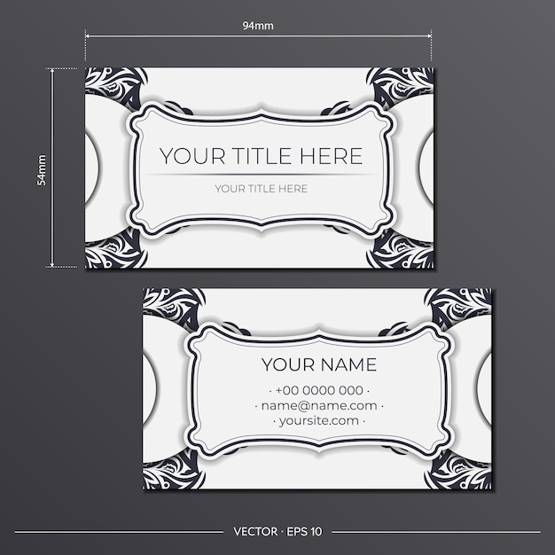 Business cards are white with vintage black ornament. Design of a business card with mandala patterns.