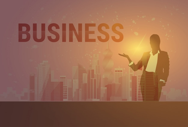 Business woman black silhouette open palm to copy space over modern city background