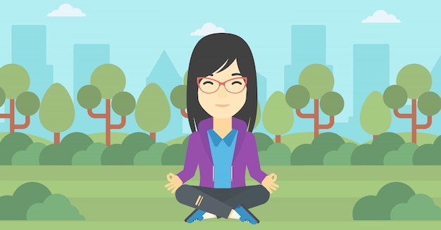 Business woman meditating in lotus position.