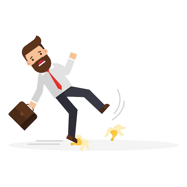 Businessman slipping on a banana peel