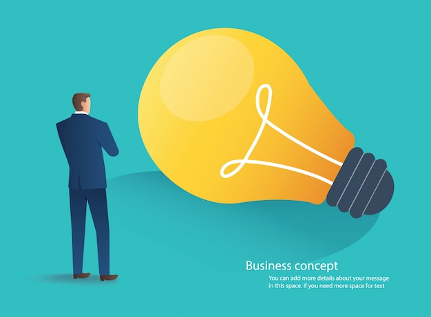 Businessman standing with light bulb idea concept