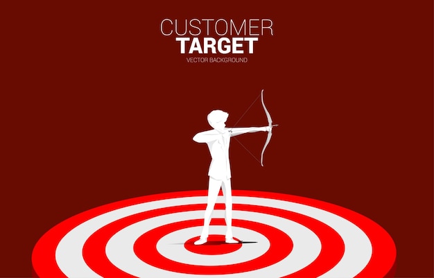 Businessman in suit shoot the arrow on dartboard concept of perfect recruitment human resource put the right man on the right job