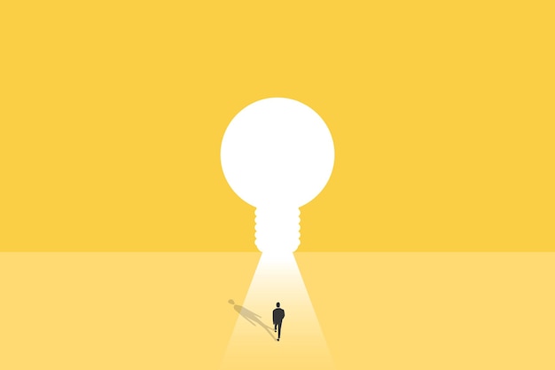 Businessman walking through light bulb shape door creative concept