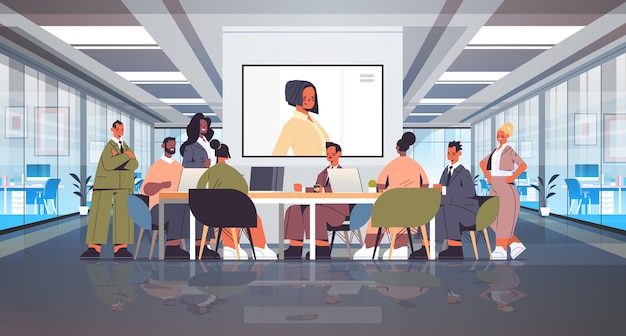 Vector businesspeople having online conference mix race business people discussing with businesswoman during video call office meeting room interior  full length  illustration