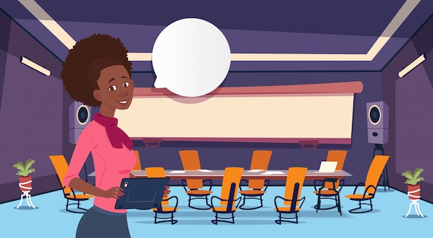 businesswoman holding tablet with speech bubble