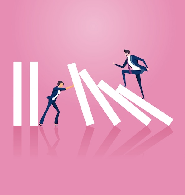 businesswoman trying to stop domino effect 