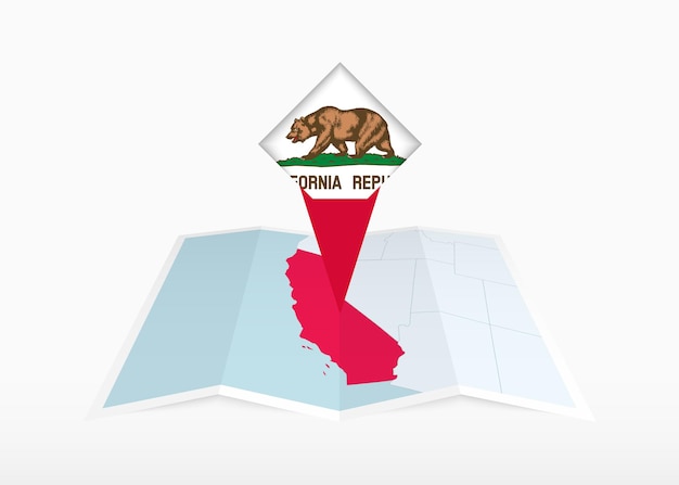 California is depicted on a folded paper map and pinned location marker with flag of california
