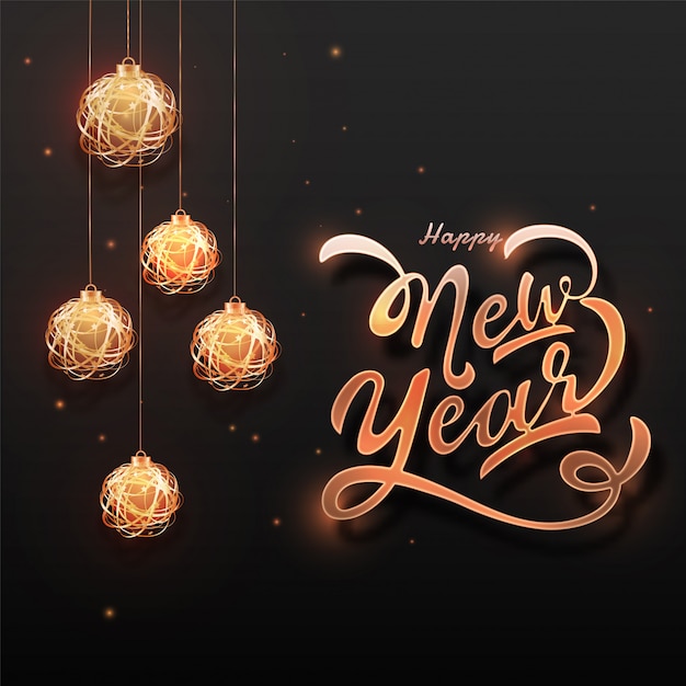Calligraphy of Happy New Year with hanging baubles decorated on black  with lighting effect.  greeting card .
