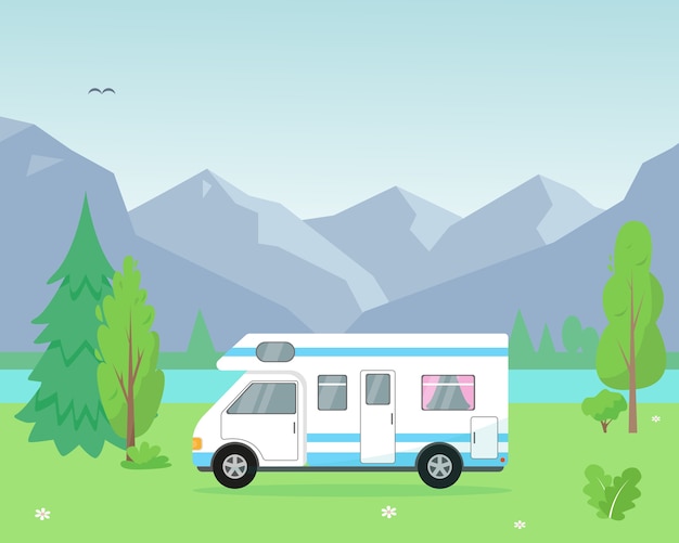 Camping trailer near the lake and mountains