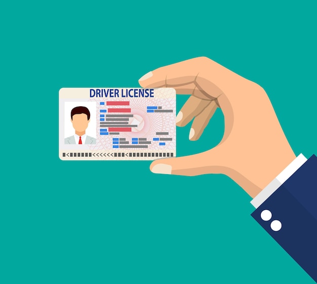 Car driver license identification card in hand