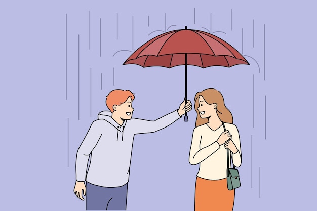 Caring man protect woman from rain with umbrella
