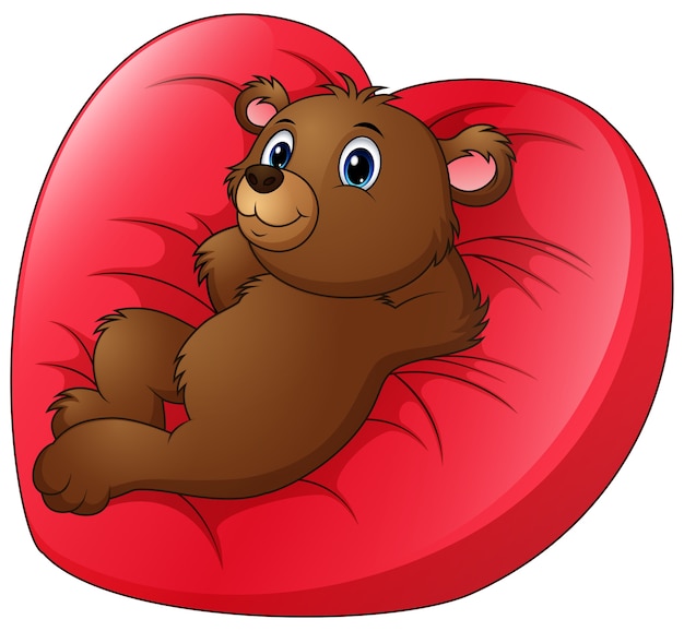 漫画のクマは、心臓の形のベッドでリラックス