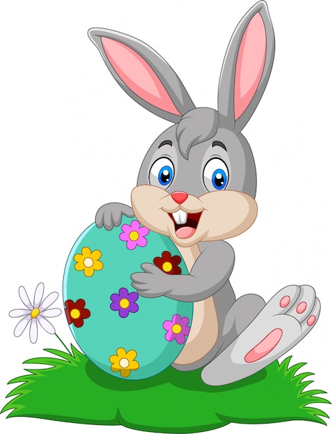 Cartoon bunny holding easter egg