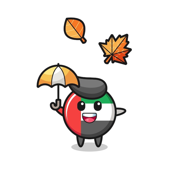 Vector cartoon of the cute uae flag badge holding an umbrella in autumn