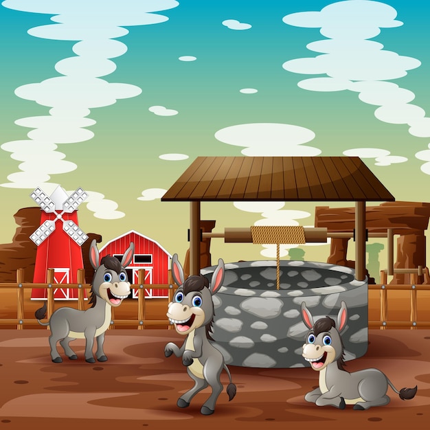農場の井戸で遊ぶ3匹のロバの漫画