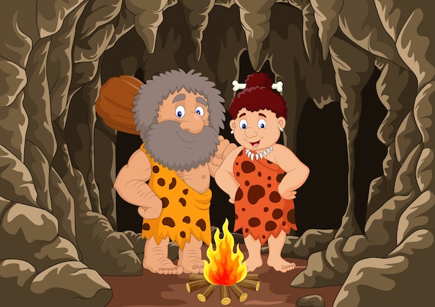 Vector cartoon prehistoric caveman couple with cave background