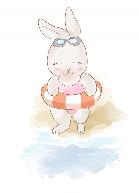 Cartoon rabbit and swim ring on the beach