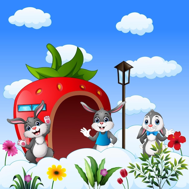 Cartoon three of bunnies in front the strawberry house