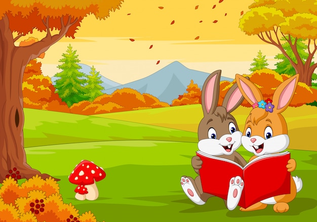 Cartoonparen van konijnen die een boek in het de herfstbos lezen