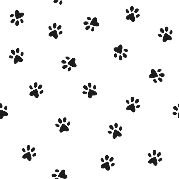 ベージュ色の背景に小さな猫の爪のシームレスなパターン