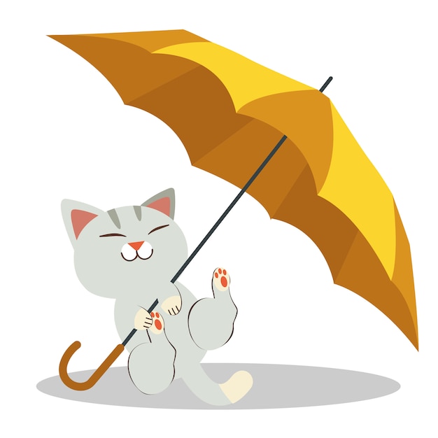 The cat playing with the yellow umbrella . the cats look happy and relaxing.