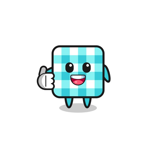 Checkered tablecloth mascot doing thumbs up gesture