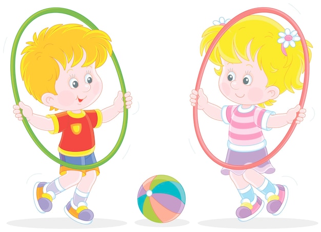 Cheerful cute little kids in colorful sport clothes playing and fun spinning hoops