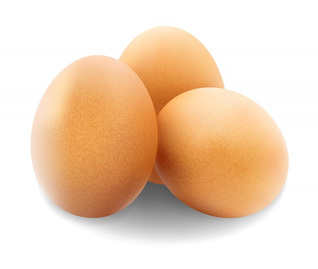 Chicken eggs isolated on white .