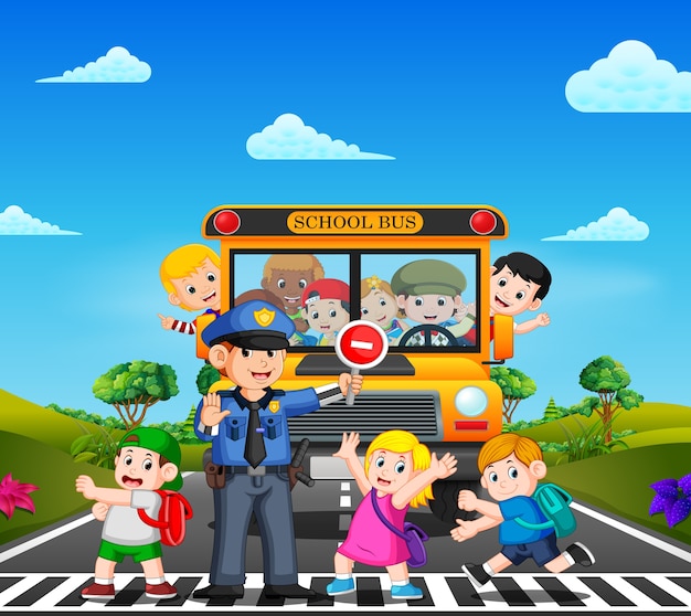 Children cross the road while the police stop the school bus and the children waving