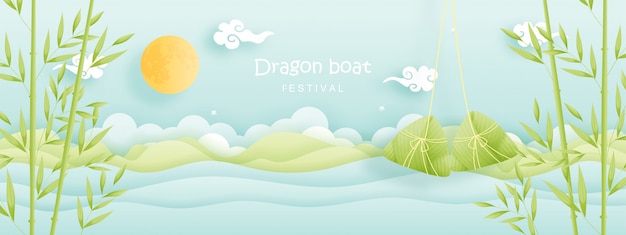 餃子と笹の葉、川と中国のドラゴンボートフェスティバル。ペーパーカット