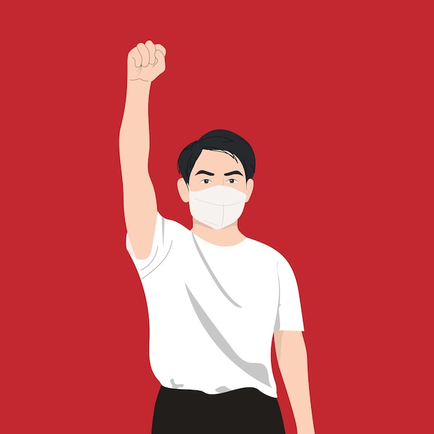 Chinese man in mask raised his fist up