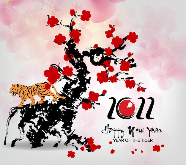 Chinese new year 2022 year of the tiger red and gold flower and asian elements paper cut with craft