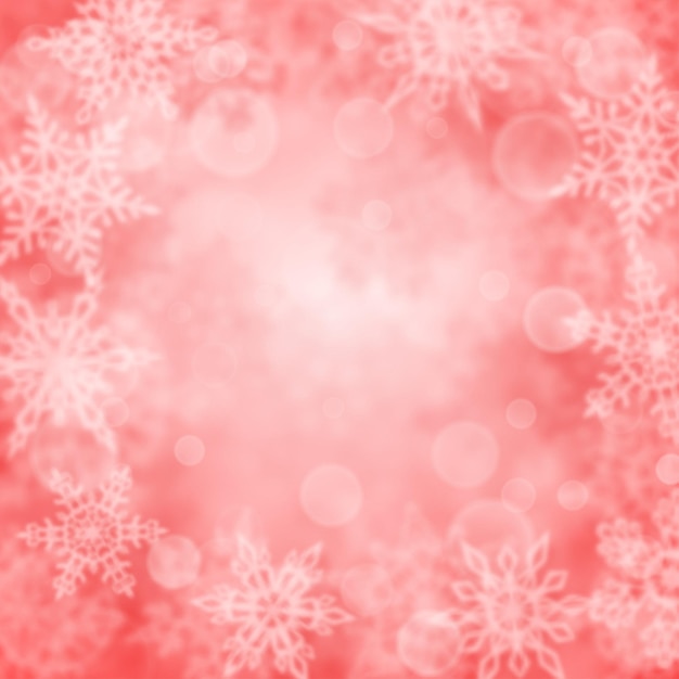 Christmas background of blurry snowflakes in pink colors