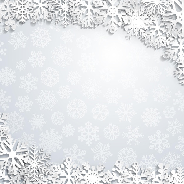 Christmas background of paper snowflakes with shadows