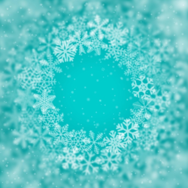 Christmas background of snowflakes of different shape, blur and transparency, arranged in a circle, on turquoise background