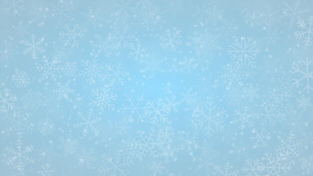 Christmas background of snowflakes of different shapes sizes and transparency in light blue colors