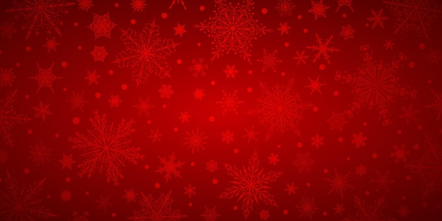 Christmas background of various complex big and small snowflakes in red colors