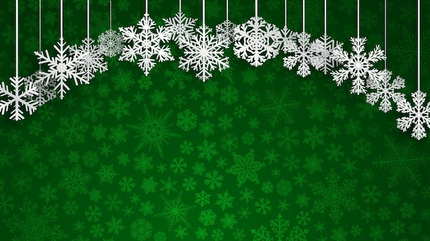 Christmas background with big white hanging snowflakes on green background of small snowflakes Christmas vector illustration of beautiful big and small snowflakes Snowflakes hanging down on the ropes