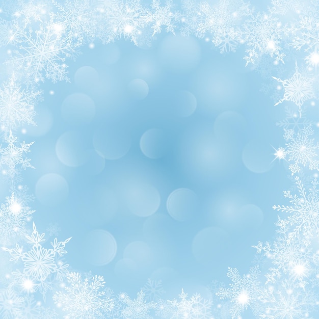 Новогодний фон с рамкой из снежинок в форме круга в голубых тонах и с эффектом боке