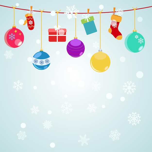 Christmas background with hanging gift boxes, socks and christmas balls on light blue